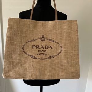 Authentic Prada rafia bag, NWOT,  dress it up or take to the beach. 3 in stock